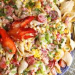 Lobster pasta salad in a large serving bowl