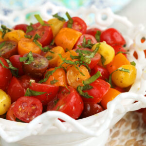 Marinated tomatoes in serving bowl