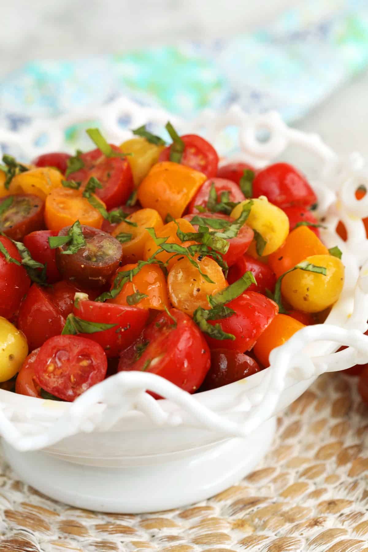 Marinated tomatoes in serving bowl