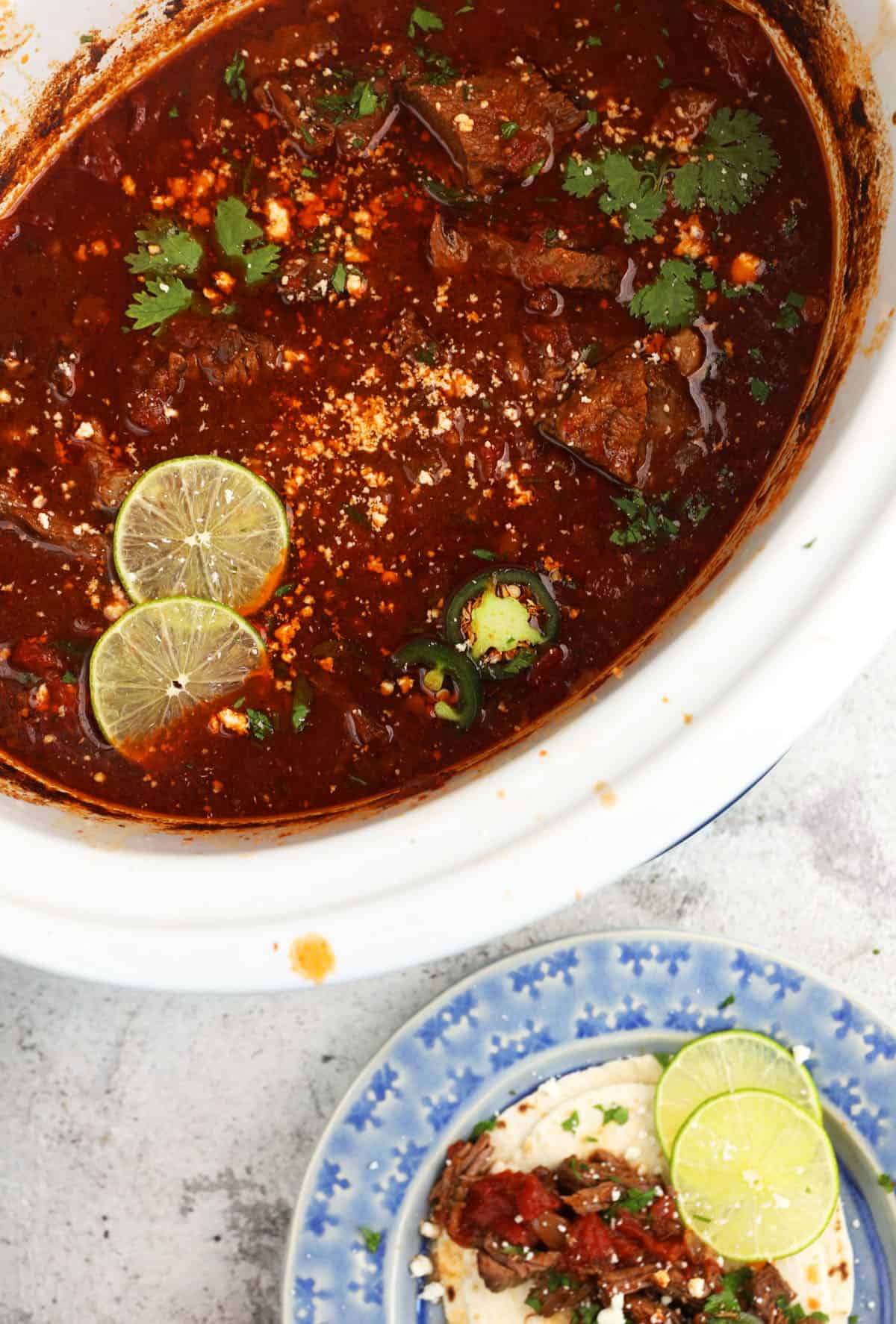 Overhead view of Mexican shredded beef in slow cooker