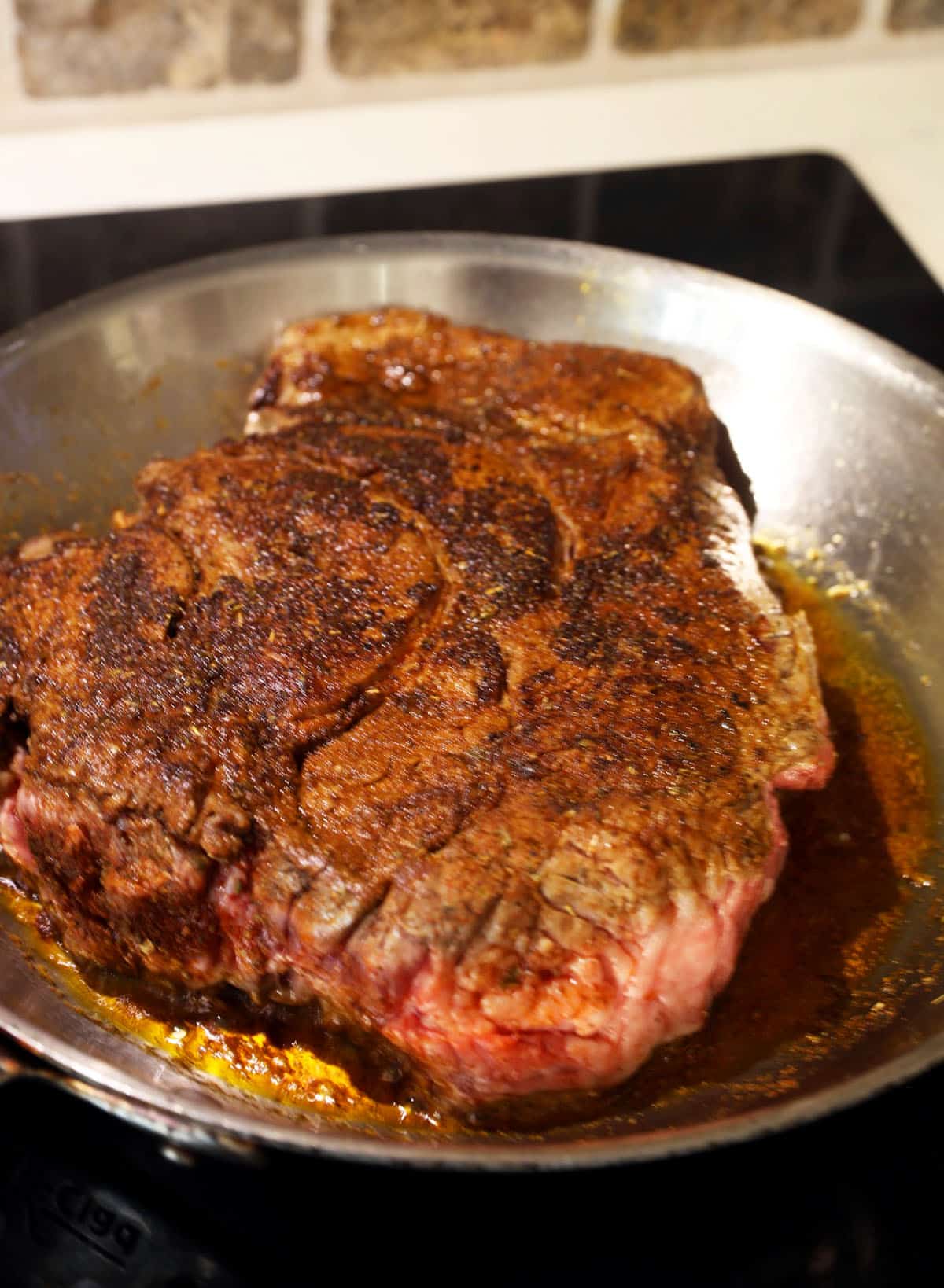 Searing chuck roast in pan for Mexican shredded beef