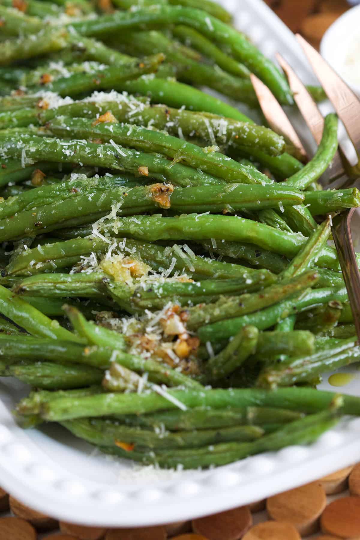 Roasted green beans on platter