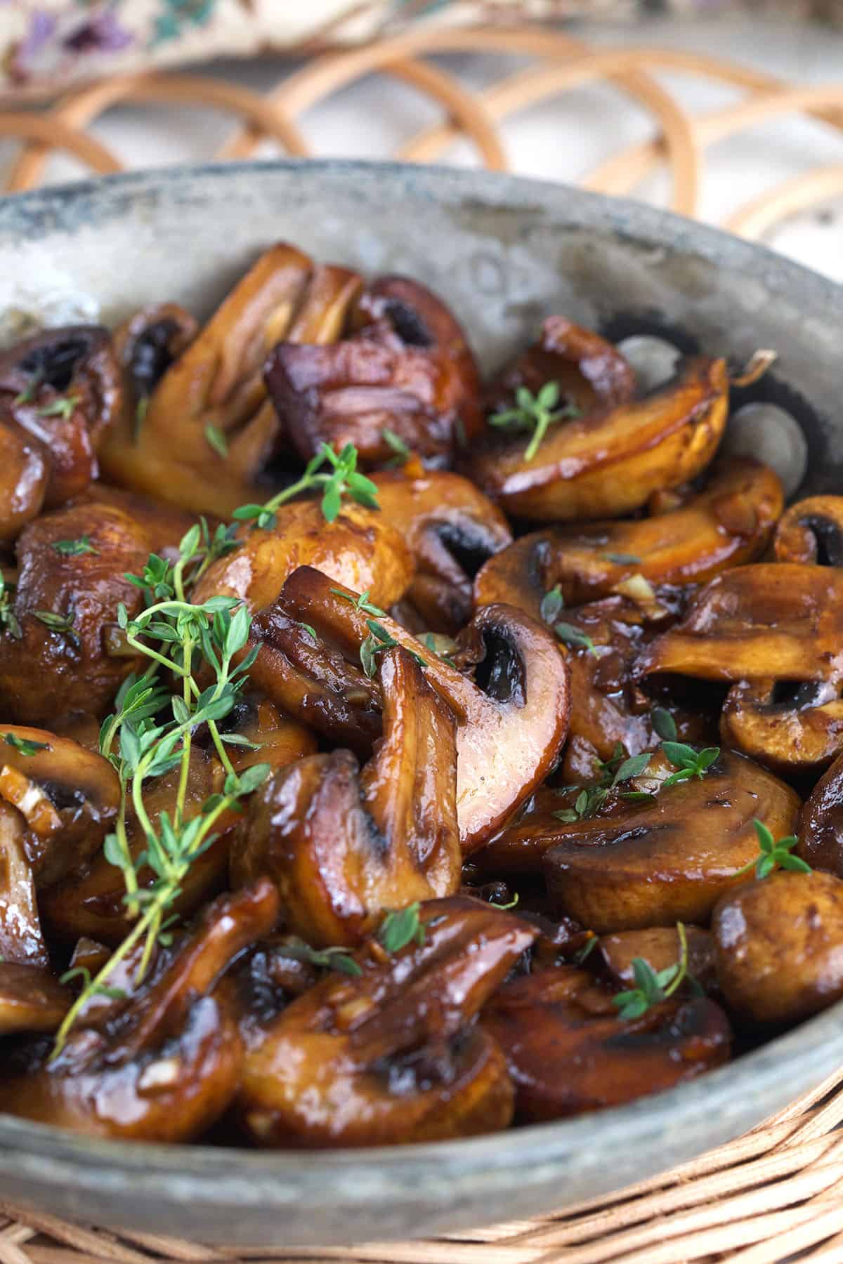 Skillet of sauteed mushrooms with garlic butter