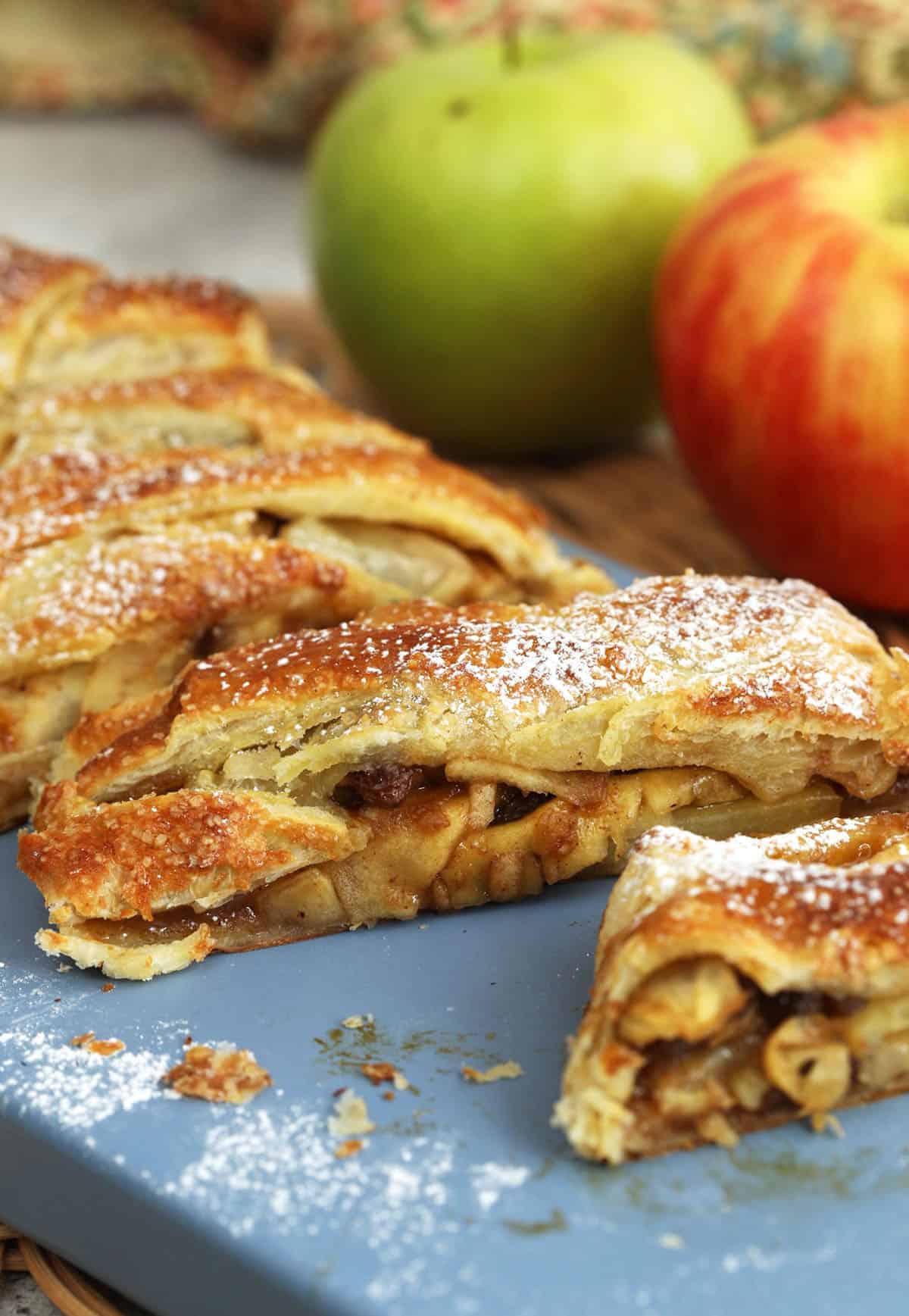 Sliced apple strudel on platter