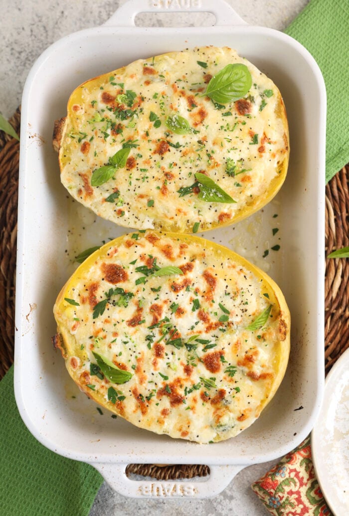 Overhead view of baked spaghetti squash alfredo in casserole dish