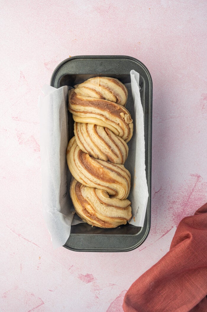 Overhead view of cinnamon babka in pan before baking