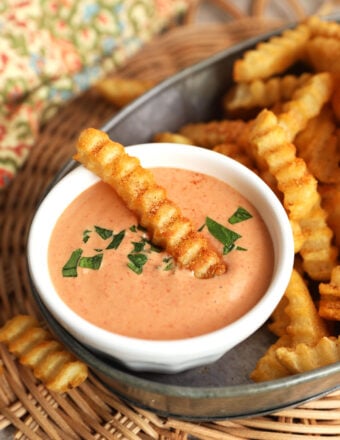 Bowl of French fry sauce with fry