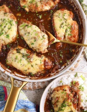 Overhead view of French onion chicken in skillet