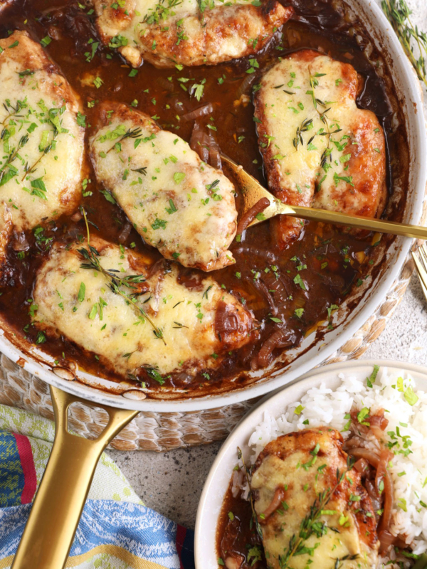 Overhead view of French onion chicken in skillet