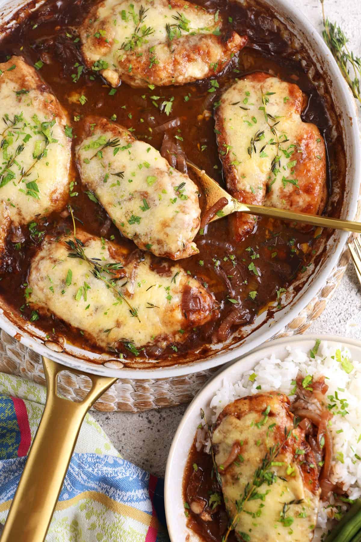 Overhead view of French onion chicken in skillet