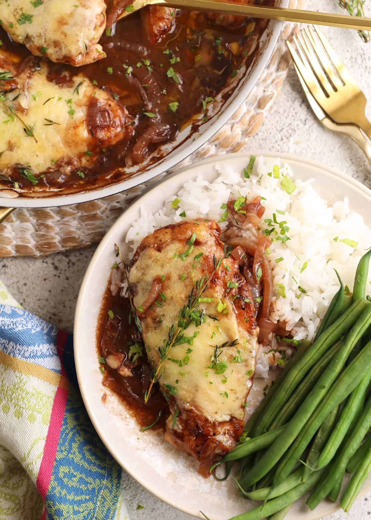 Overhead view of French onion chicken on plate