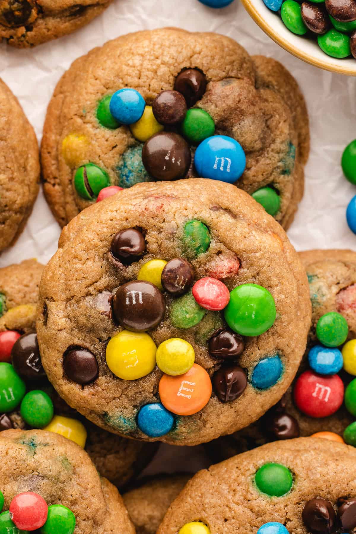 Overhead view of chocolate chip M&M cookies on countertop