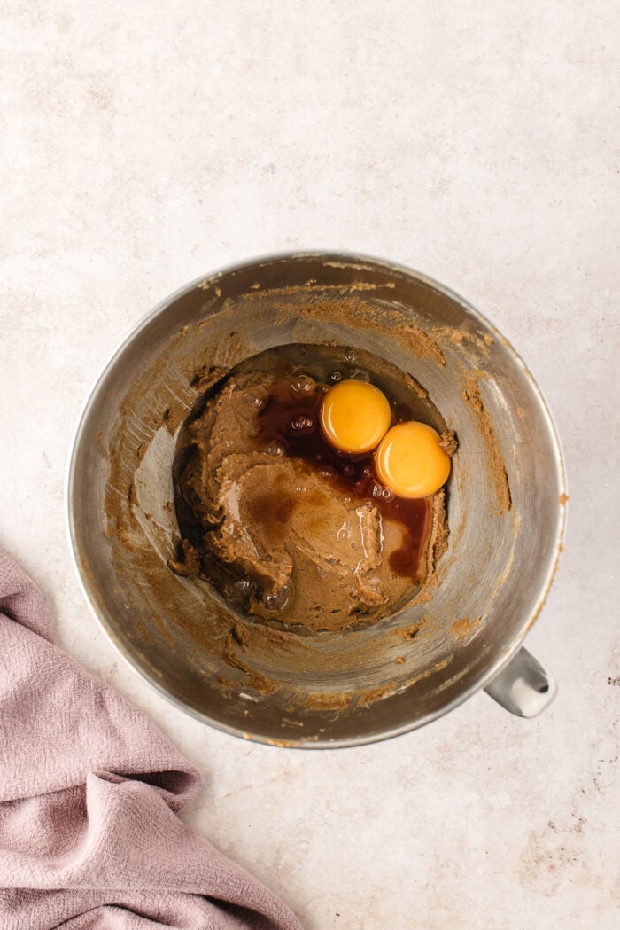 Eggs added to mixing bowl with cookie dough