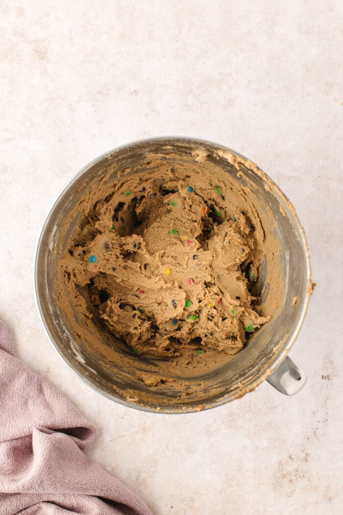 Overhead view of dough for chocolate chip M&M cookies