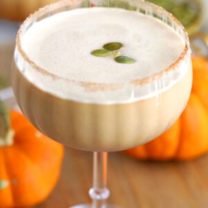 Pumpkin spice latte martini topped with pepitas