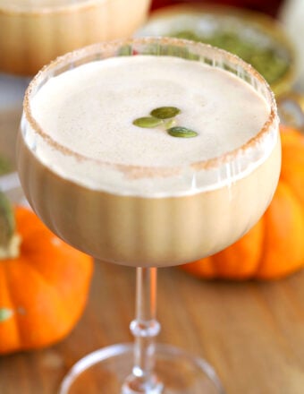 Pumpkin spice latte martini topped with pepitas