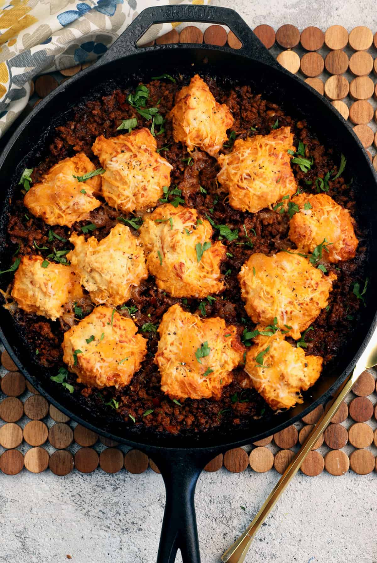 Overhead view of sloppy joe casserole in cast iron skillet