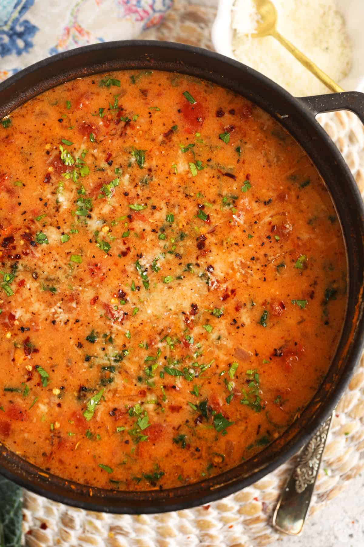 Overhead view of Tuscan white bean soup in Dutch oven