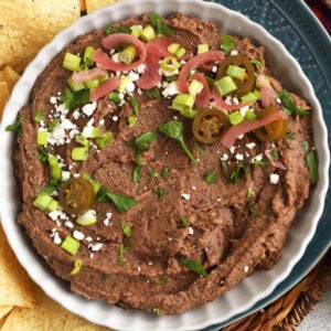 Black bean dip in bowl with tortilla chips