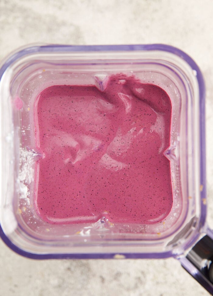 Overhead view of blueberry smoothie in blender