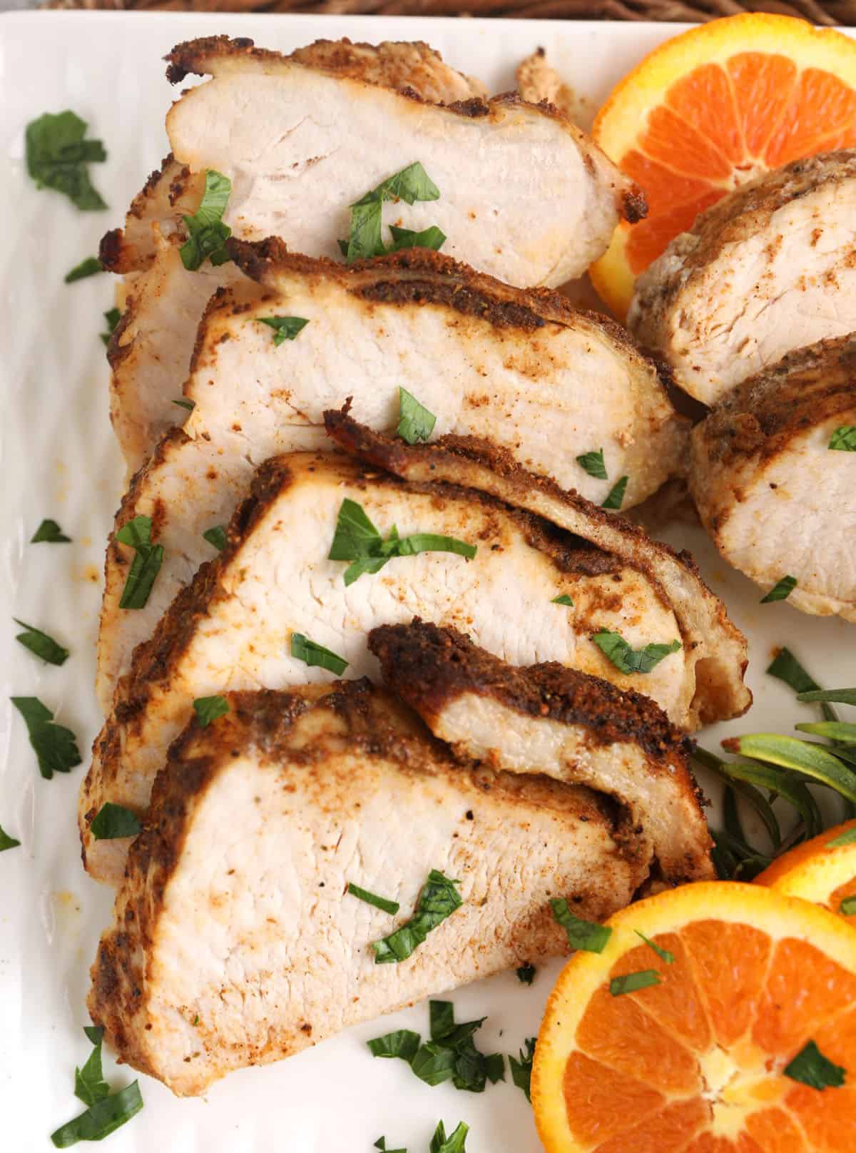 Sliced Cajun blackened turkey breast on platter