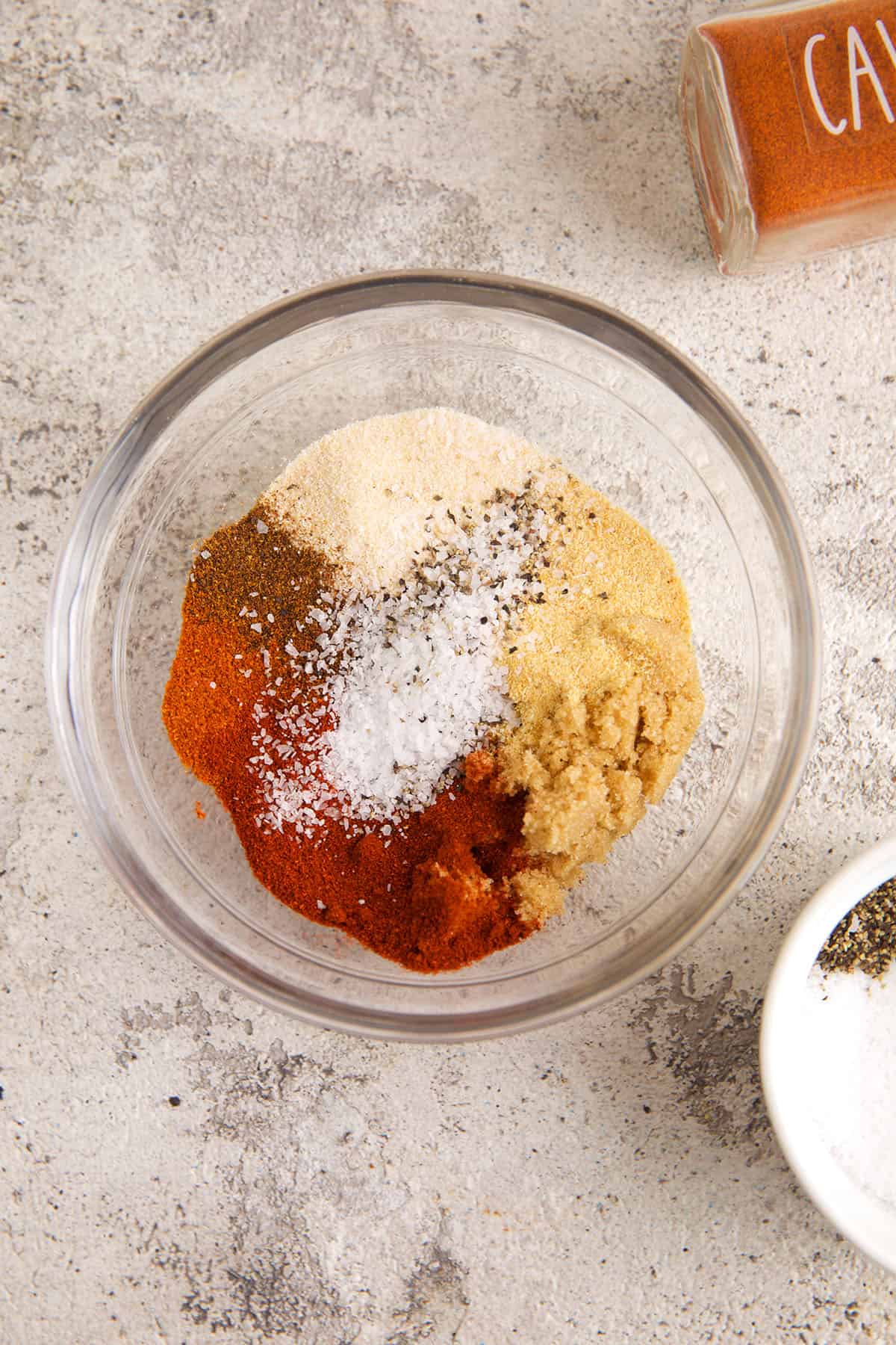 Chicken wing seasoning ingredients in bowl before whisking