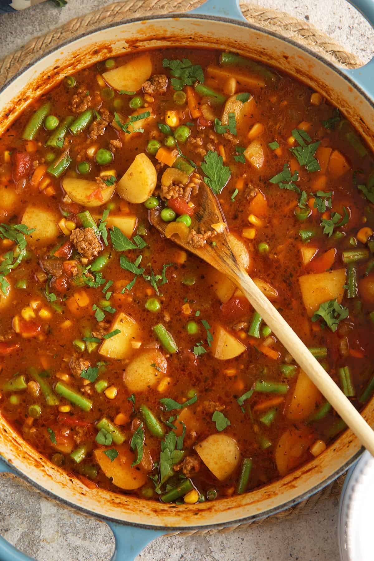 Overhead view of hamburger soup in Dutch oven