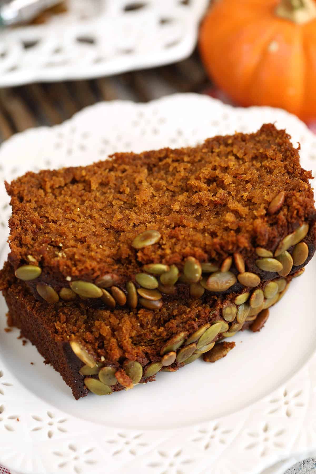 Two slices of pumpkin loaf on plate