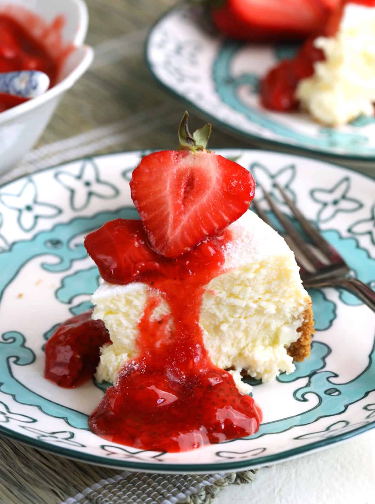 Slice of cheesecake with strawberry compote