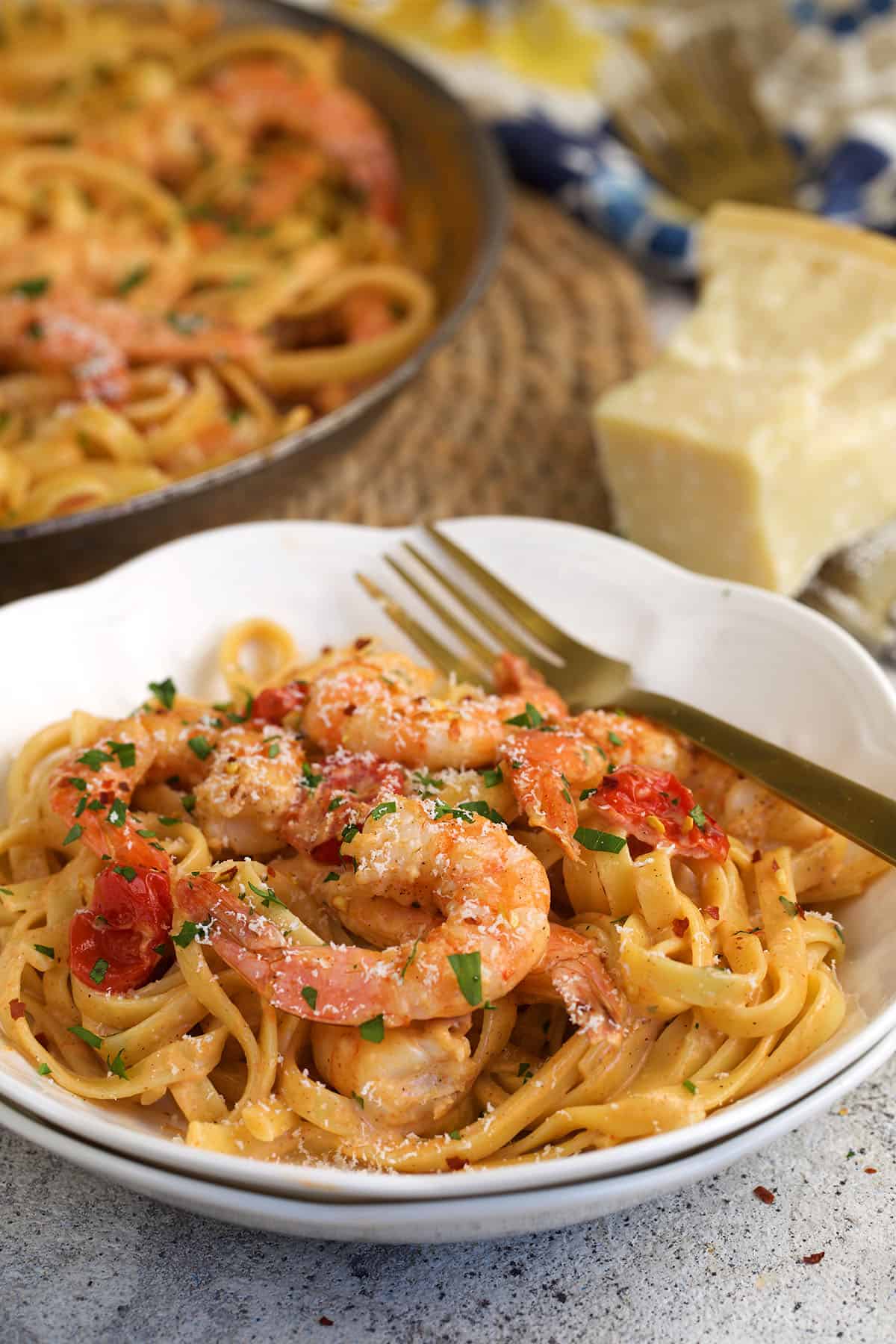 Cajun shrimp pasta on plate with fork