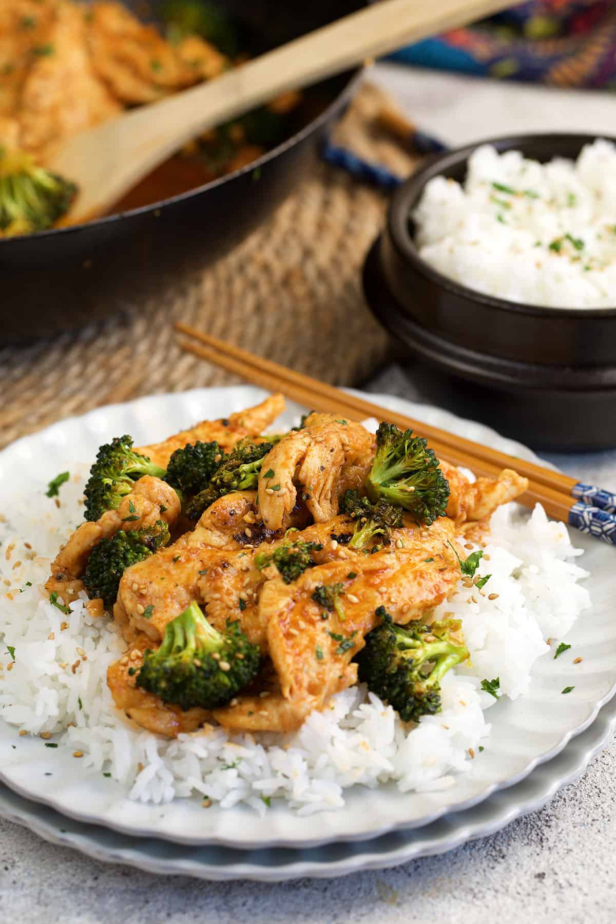 Plate of chicken and broccoli stir fry with rice