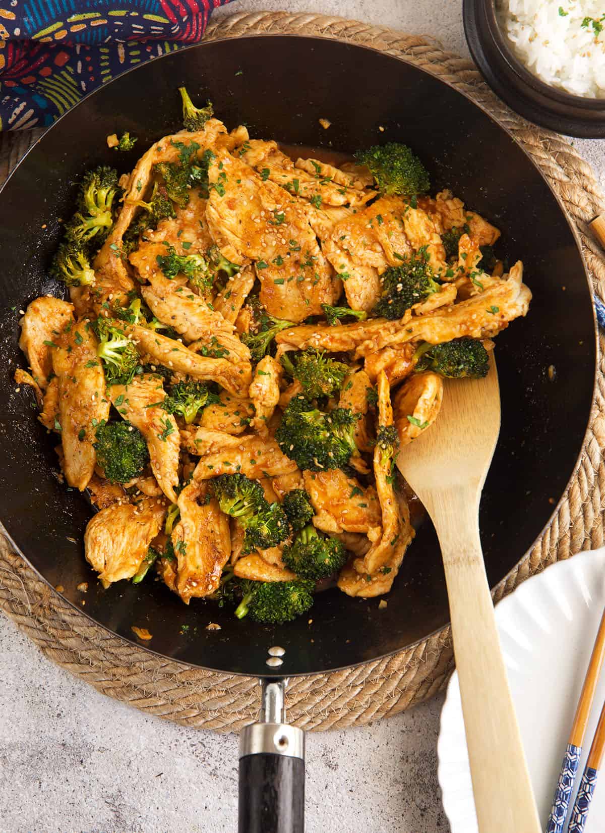 Chicken and broccoli stir fry in skillet