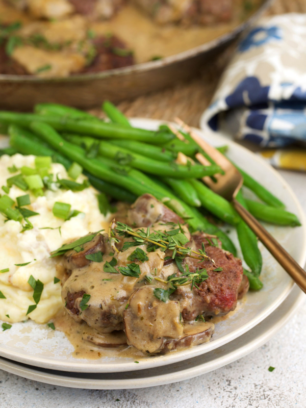 Chopped steak with gravy on plate