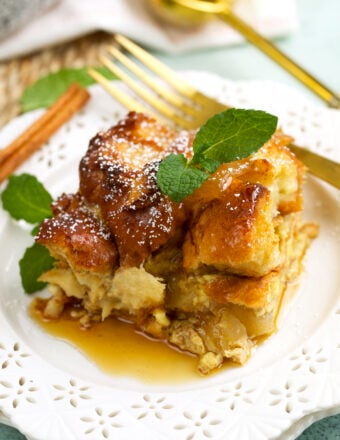 Serving of cinnamon apple French toast casserole on plate