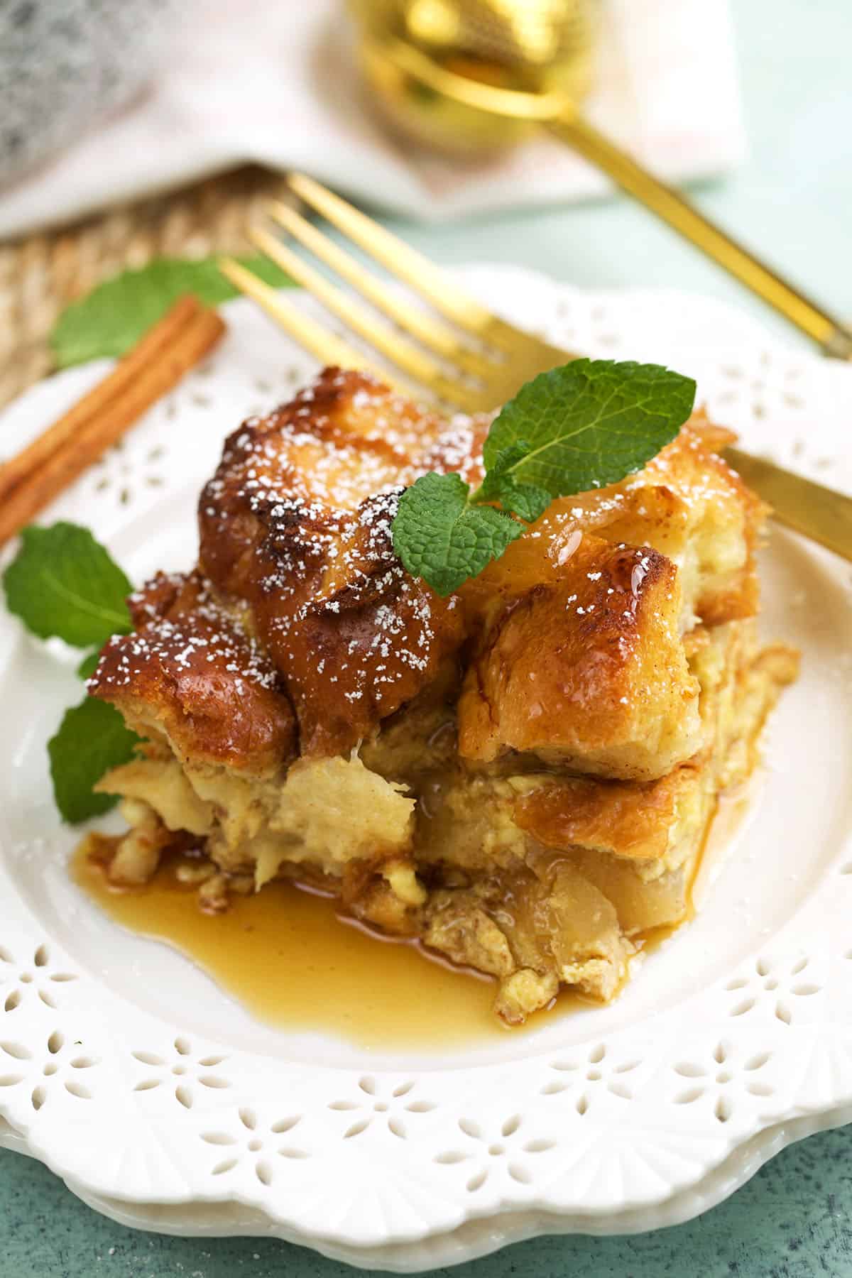 Serving of cinnamon apple French toast casserole on plate