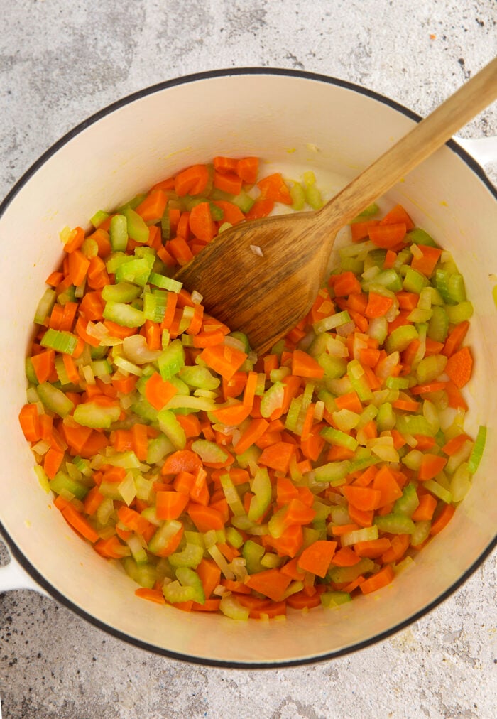 Carrots and celery cooking in pot