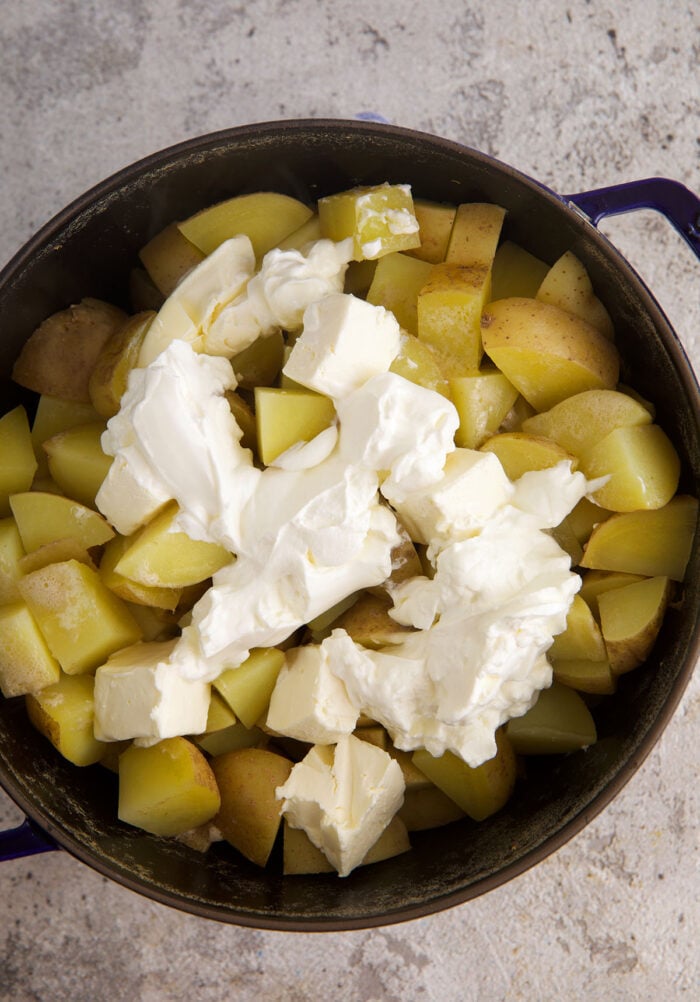 Boiled potatoes with sour cream and cream cheese