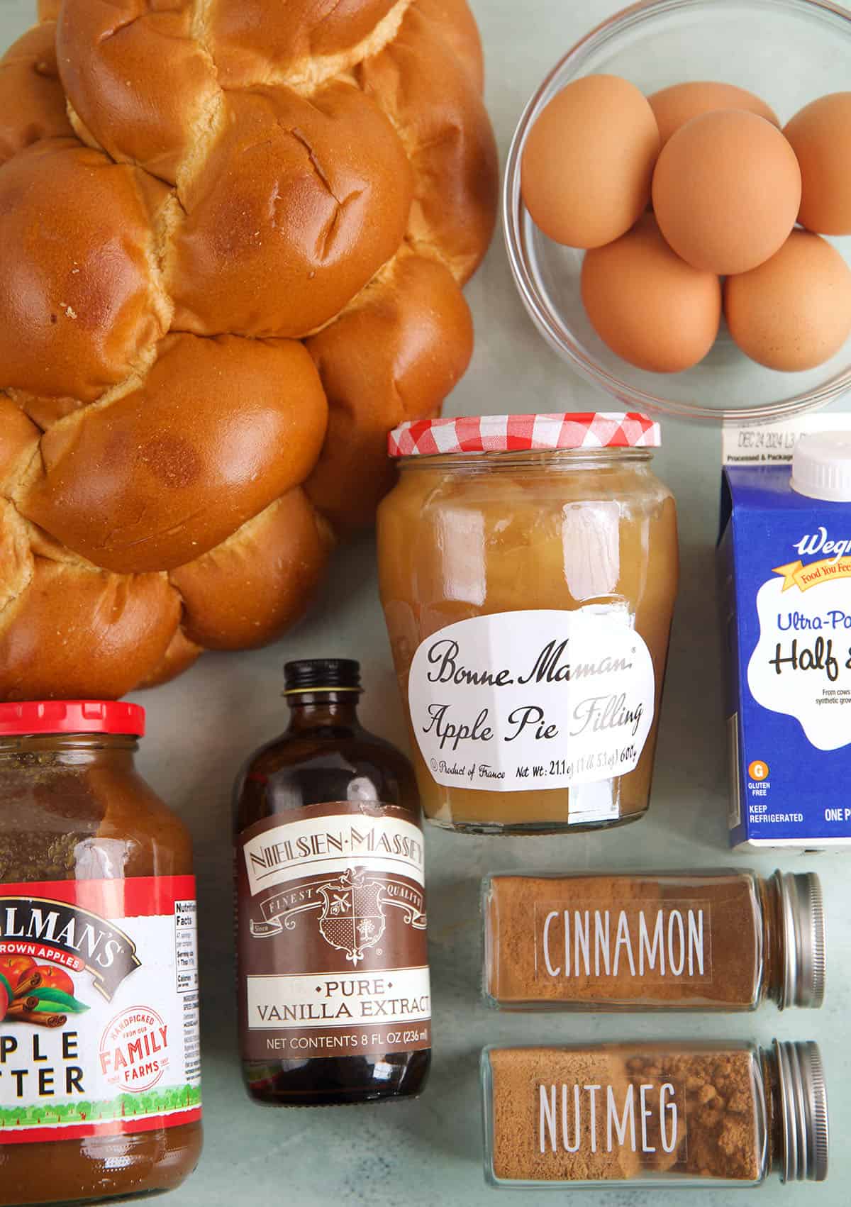 Overhead view of ingredients for cinnamon apple French toast casserole