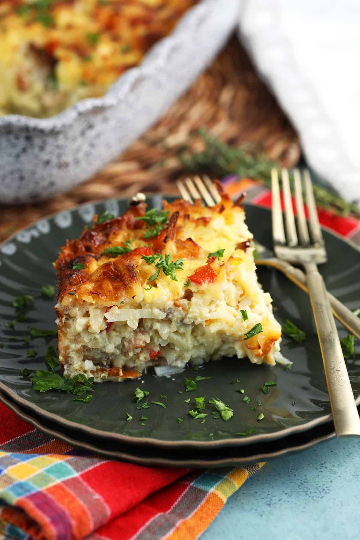 Amish hash brown breakfast casserole on plate with fork