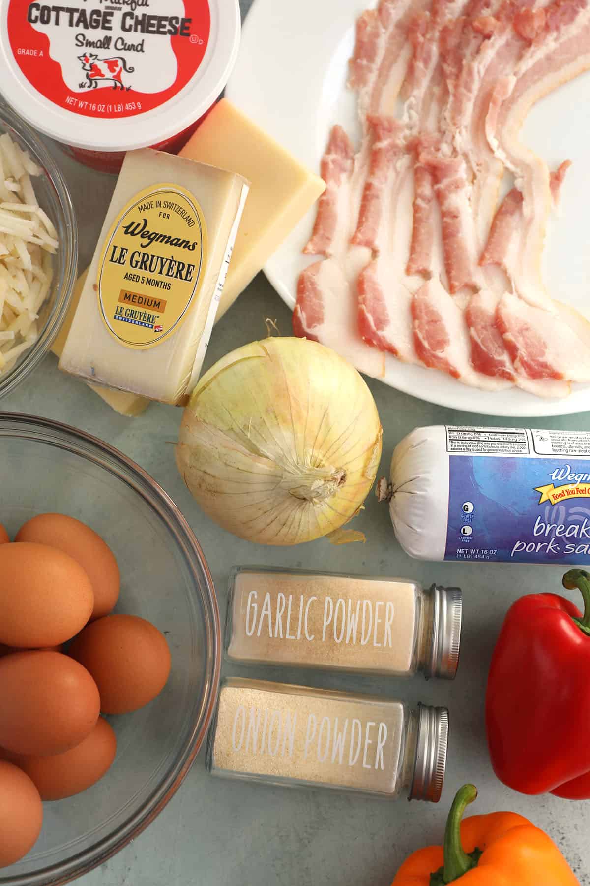 Overhead view of ingredients for Amish hash brown breakfast casserole