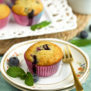 Moist banana blueberry muffin on plate