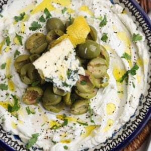 Overhead view of dirty martini dip in bowl