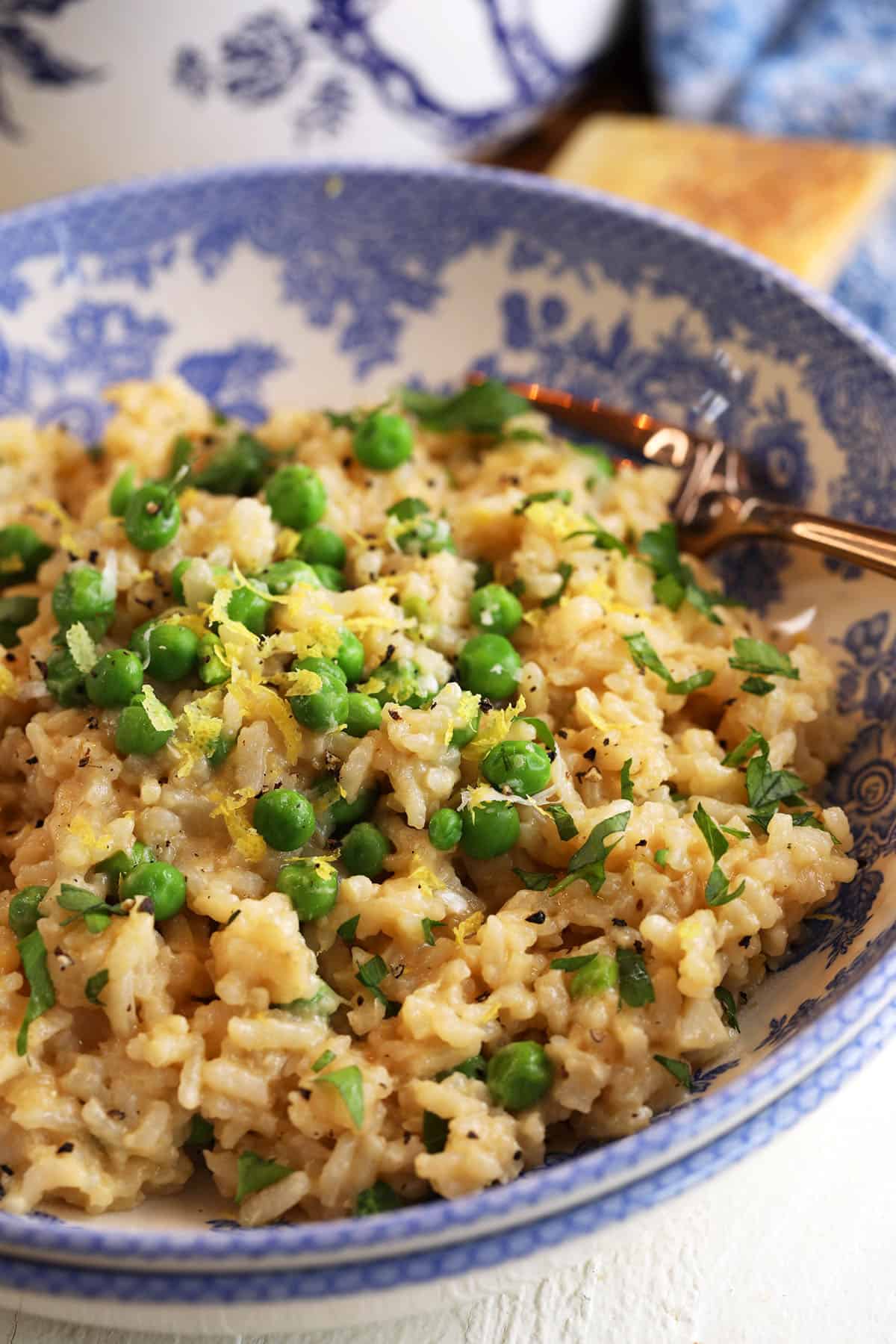 Garlic Parmesan risotto with peas in bowl