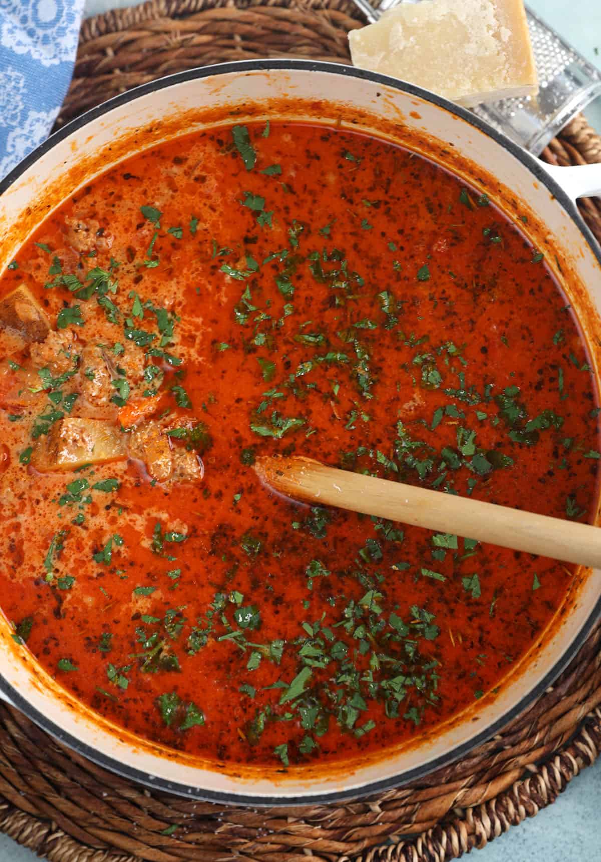 Overhead view of sausage potato soup in pot