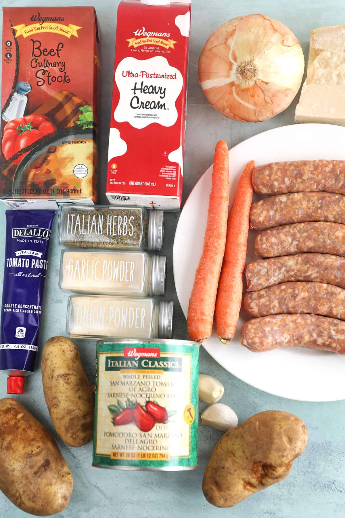 Overhead view of ingredients for sausage potato soup