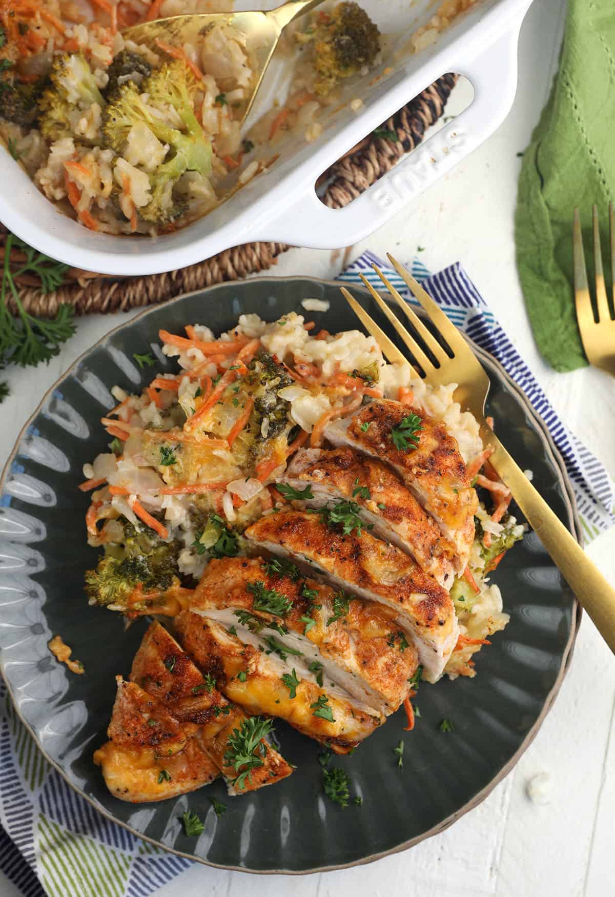 Overhead view of cheesy chicken and rice casserole on plate