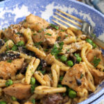 Creamy chicken mushroom pasta in bowl