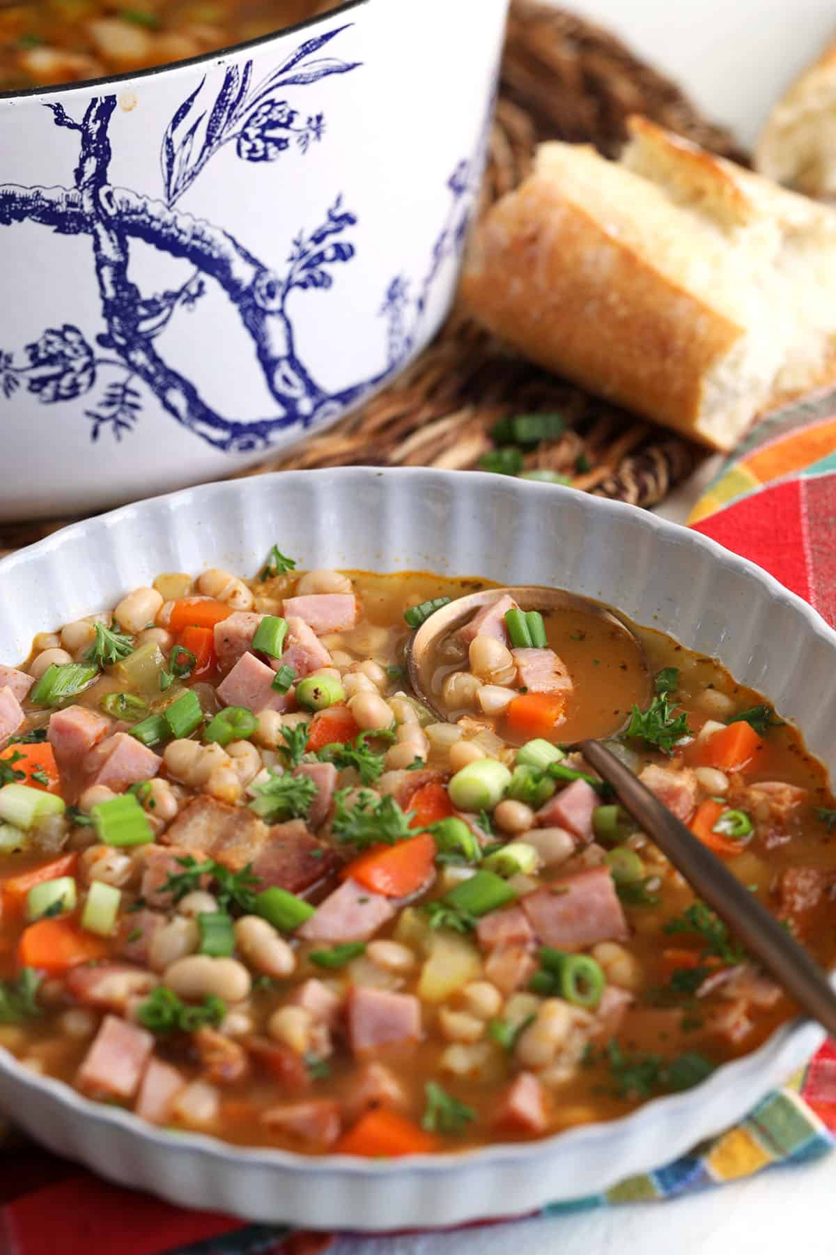 Bowl of navy bean soup with ham