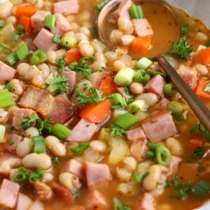 Navy bean soup with ham in bowl