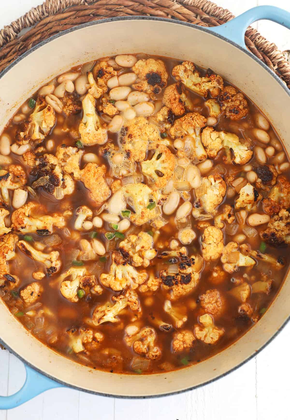 Overhead view of Southwestern creamy cauliflower soup in pot before pureeing